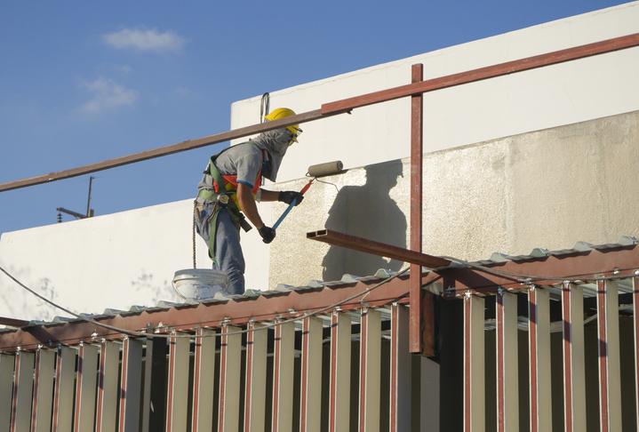 commercial painters applying durable coatings on Perth business property