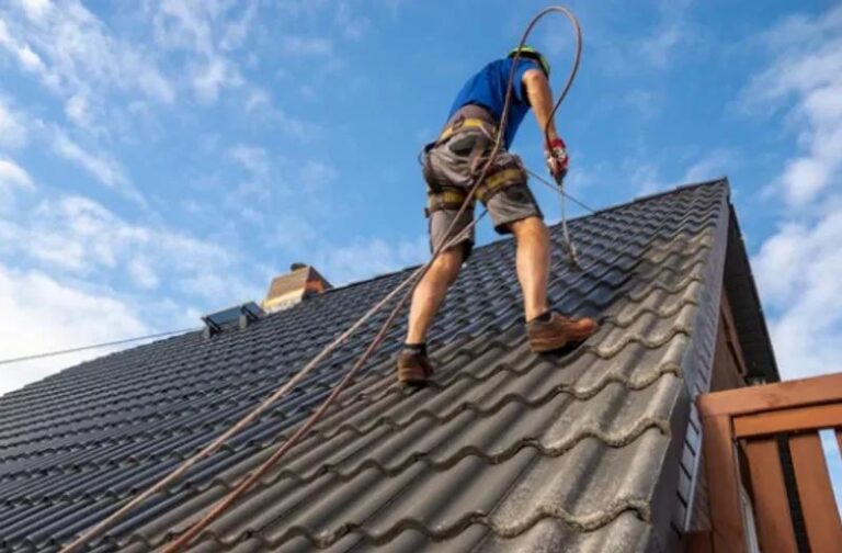 Professional roof painting project completed on a Perth home