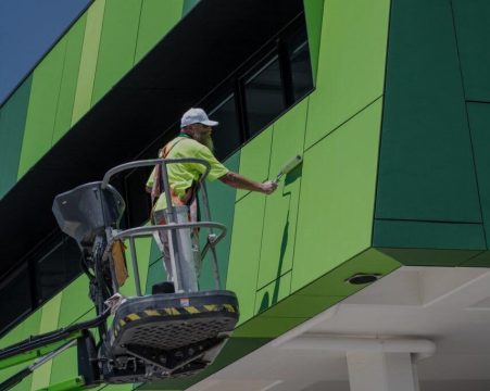 Commercial painter working on a business property in Cloverdale WA