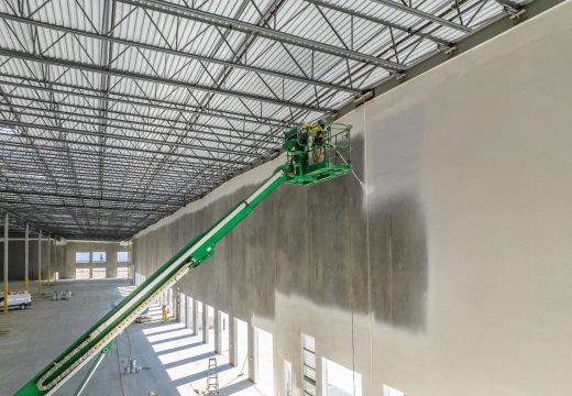 Professional commercial painters working on a commercial building in Kewdale