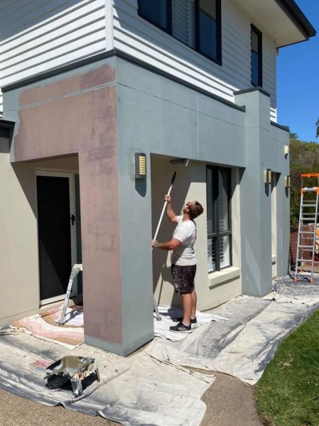 Exterior painter working on a renovated home in Perth
