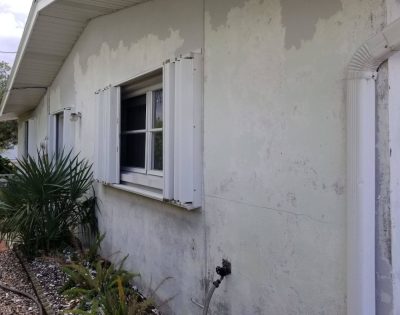 Faded and peeling exterior paint on a Perth home before repainting