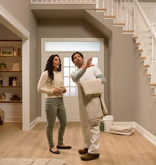 Homeowner discussing a residential painting project with a house painter in Perth
